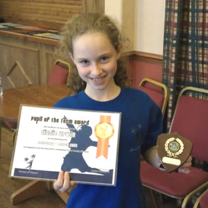 Lizzie Urwin with her certificate & Eve Smith award